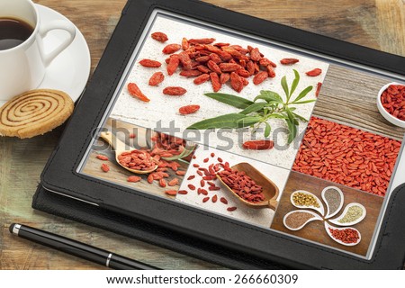 Reviewing and editing pictures of goji berries on a digital tablet. All screen pictures copyright by the photographer.