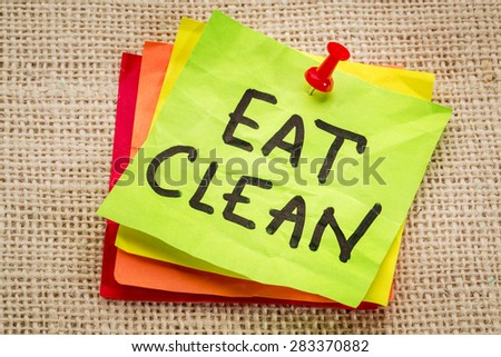 eat clean reminder on sticky note - healthy eating concept