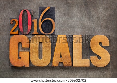 2016 goals - New Year resolution concept - text in vintage letterpress wood type blocks against grunge metal background