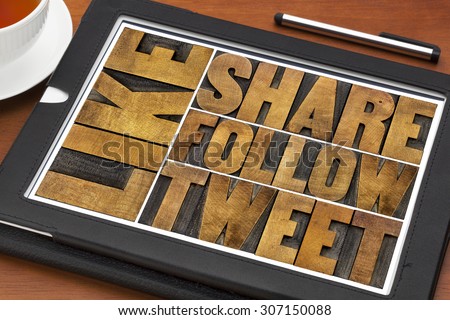 like, share, tweet, follow words-- social media and networking concept - text in letterpress wood printing blocks on a digital tablet with a cup of coffee