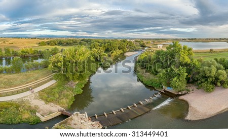 aerial panorama of the Cache la Poudre River with diversion dams and bike trail - Poudre River Trail