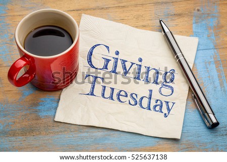 Giving Tuesday concept - handwriting on a napkin with a cup of espresso coffee