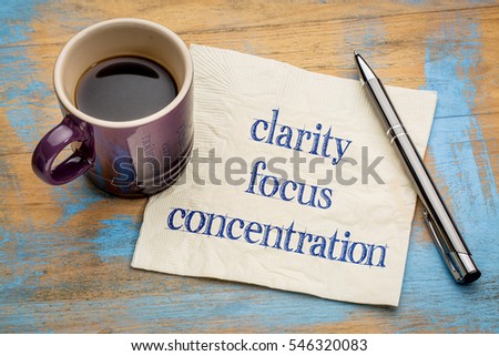 clarity, focus and concentration  inspirational words - handwriting on a napkin with a cup of espresso coffee