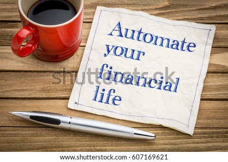 Automate your financial life advice - handwriting on a napkin with a cup of espresso coffee
