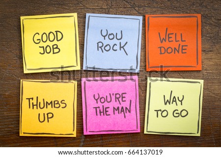 way to go, good job, well done, you're the man, thumbs up, you rock - a set of colorful sticky notes with positive affirmation words against rustic wood