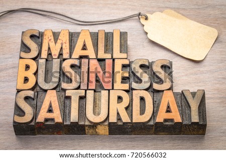 Small Business Saturday word abstract - text in vintage letterpress wood type with a blank price tag, holiday shopping concept