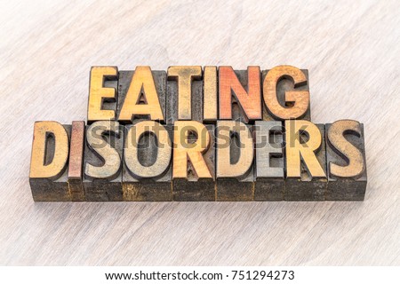 eating disorders word abstract in vintage letterpress wood type printing blocks