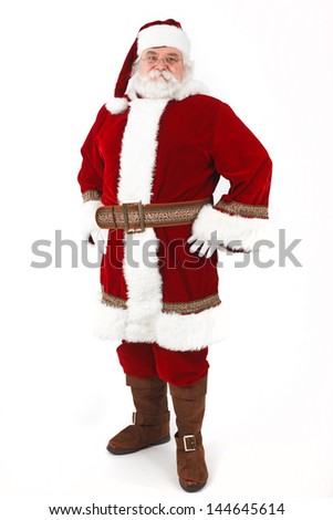 Full Body Shot of Santa Claus with his hands on his hips isolated on white background Full Body Shot of Santa Claus with his hands on his hips isolated on white background