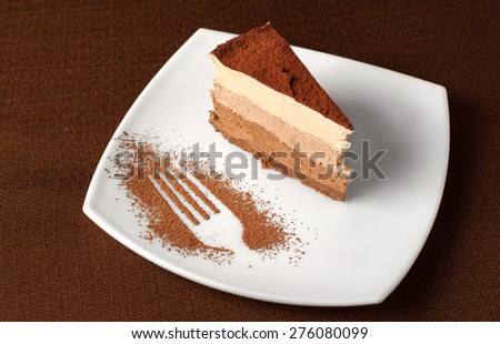 Chocolate cheesecake on a dark background. Dessert.