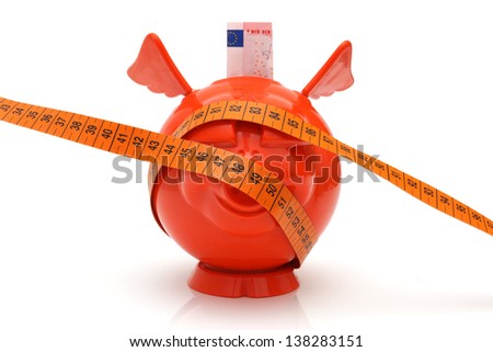 concept of no money with piggy bank and measuring tape