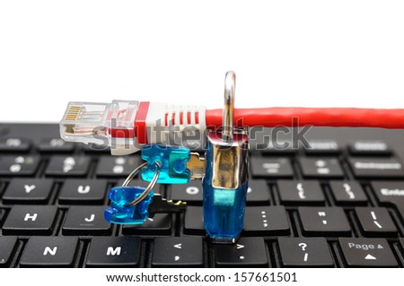 Internet security and network protection concept, padlock and connection plug on keyboard