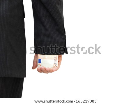 Businessman with money hidden under sleeve