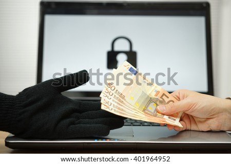person is giving money to computer hacker to decrypt files, computer ransomware concept