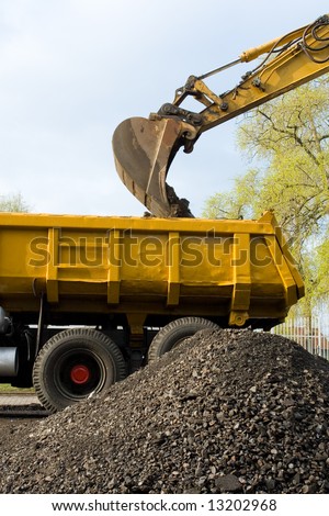 Works in an industrial zone in construction witch excavator machines