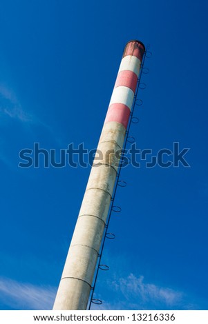 Old factory chimney reaching for the sky