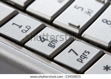 Silver mobile phone (keyboard with numbers and letters)