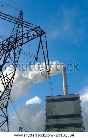Electric power station with smokestacks on the blue background