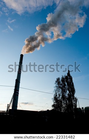 air pollution - smoke billowing from chimney and Electrical tower