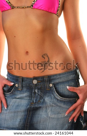 stock photo : Young woman showing her beautiful stomach tattoo