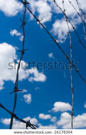 The metallic fence whit blue sky on the background