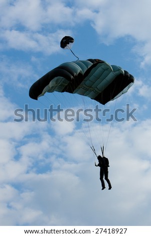 Man with a para-glider flying in the sky