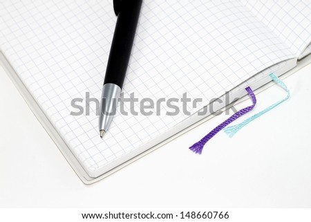 Blank notebook with pen,isolated on white.