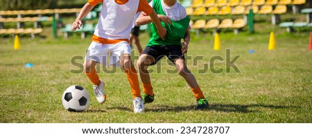 Soccer football game match for children. Kids playing training and football soccer tournament