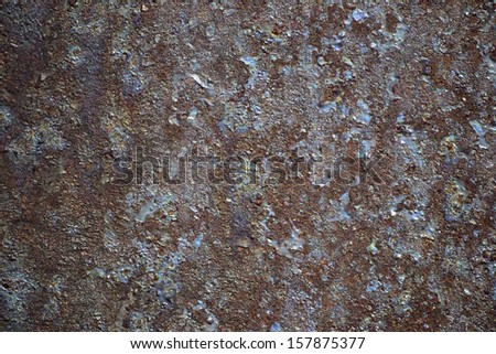 Colorful Rust and Corrosion. A colorful rust background texture. Close-up of an oxidized metal surface.