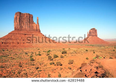 Red sandstone rock formations give Monument Valley an unearthly looking landscape that is unique and interesting to visit