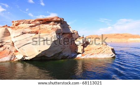 Lake Powell in Glen Canyon Recreation Area has lots  of recreational water opportunities, including houseboat rentals, water skiing, jet skiing, fishing, swimming, and exploring surrounding canyons