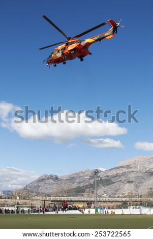 ALICANTE COAST, SPAIN - FEBRUARY 15. Search and rescue maneuvers by the Spanish army helicopter at a conference of Emergency and Public Safety in Altea, Spain, on February 15, 2015