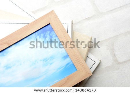 Blue sky photo in wooden frame