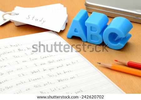 English education concept, notebook and alphabet toy