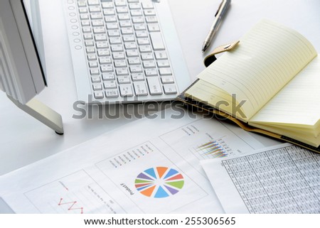Businessman\'s desk in evening with no person