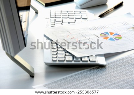 Businessman\'s desk in evening with no person