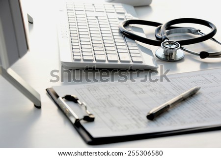 Doctor\'s desk in evening with no person