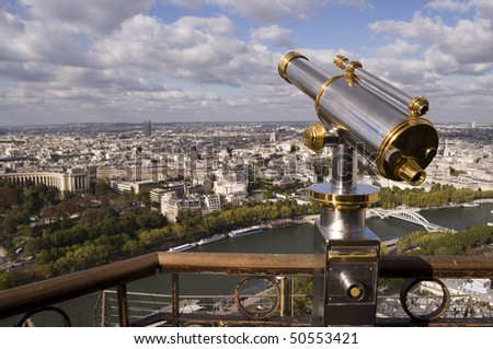 Eiffel Tower telescope overlooking the seine river towards the 8 arrondissment of Paris.