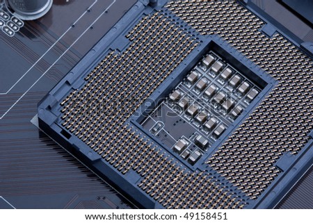 New CPU socket 1156 on black circuit board, macro in IT Technology