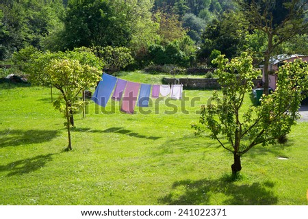 laundry hanging on a lawn
