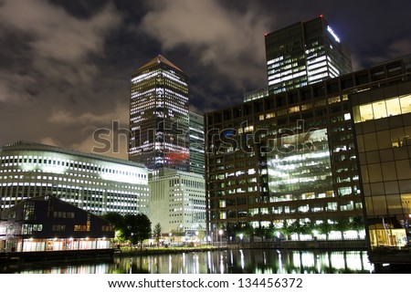 LONDON - AUGUST 6: Night shot of Canary Wharf, a major business district located in Tower Hamlets and one of London\'s two main financial centres, August 6, 2012.