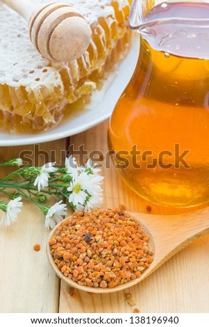 Organic bee products. Bee pollen, beehive and honey
