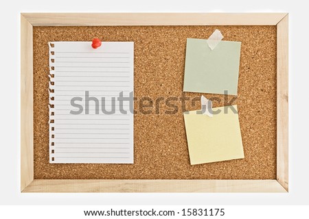 Cork Pin Board  with a sheet of paper, post it notes, and thumbtacks.
