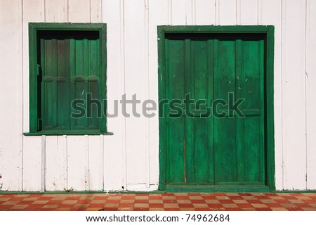 Old wooden door and window in a house in Nicaragua.