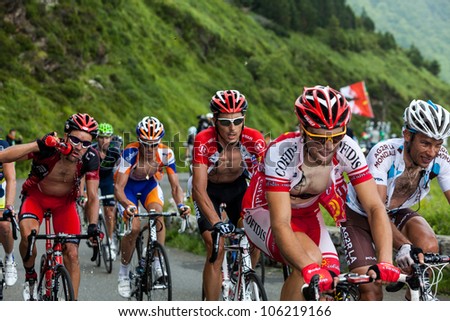 BEOST,FRANCE-JUL 15:The peloton climbing the mountain pass Aubisque in the 13 stage of 