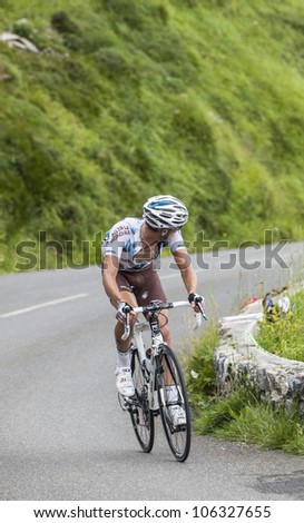 BEOST,FRANCE-JUL 15:A cyclist from AG2R La Mondiale team looking back to the followers while climbing the category H mountain pass Aubisque, during the 13th stage of Le Tour de France on July 15 2011.
