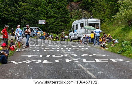 GOURETTE,FRANCE-JUL 15:Fans near the road to mountain pass Aubisque few minutes before arrival the cyclists during the 13th stage of Le Tour de France  on July 15 2011.