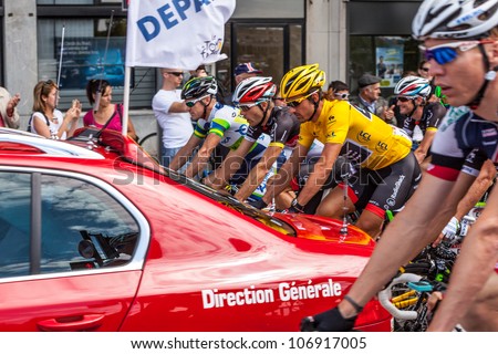 ROUEN, FRANCE,JUL 5 :Fabian Cancellara, the leader of the race, wearing the Yellow Jersey in the peloton at the start point in Rouen during the stage 5 of Le Tour de France on July 5 2012.
