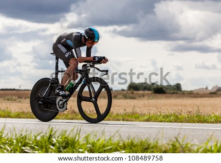BEAUROUVRE,FRANCE,JUL 21:The British cyclist Froome Christopher (Sky Procycling) pedaling during the 19th stage of Le Tour de France 2012, a time trial  between Bonneval and Chartres on July 21 2012.