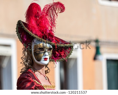 VENICE,ITALY-FEB. 26:Unidentified person wearing a characteristic masks during the Venice Carnival on February 26, 2011 in Venice, Italy. In 2011 the Carnival was held between 11- 21 February.