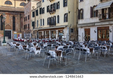 VENICE-FEB 18 Big street terraces prepared for clients in a town square on February 18, 2012 in Venice. In 2012 the Venice Carnival was held between 11- 21 February.
